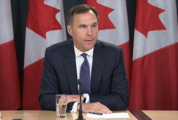 Morneau vows oilpatch support through Trans Mountain as protesters chant outside