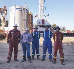 Tamarack Valley Energy employees on a drilling site in southern Alberta.